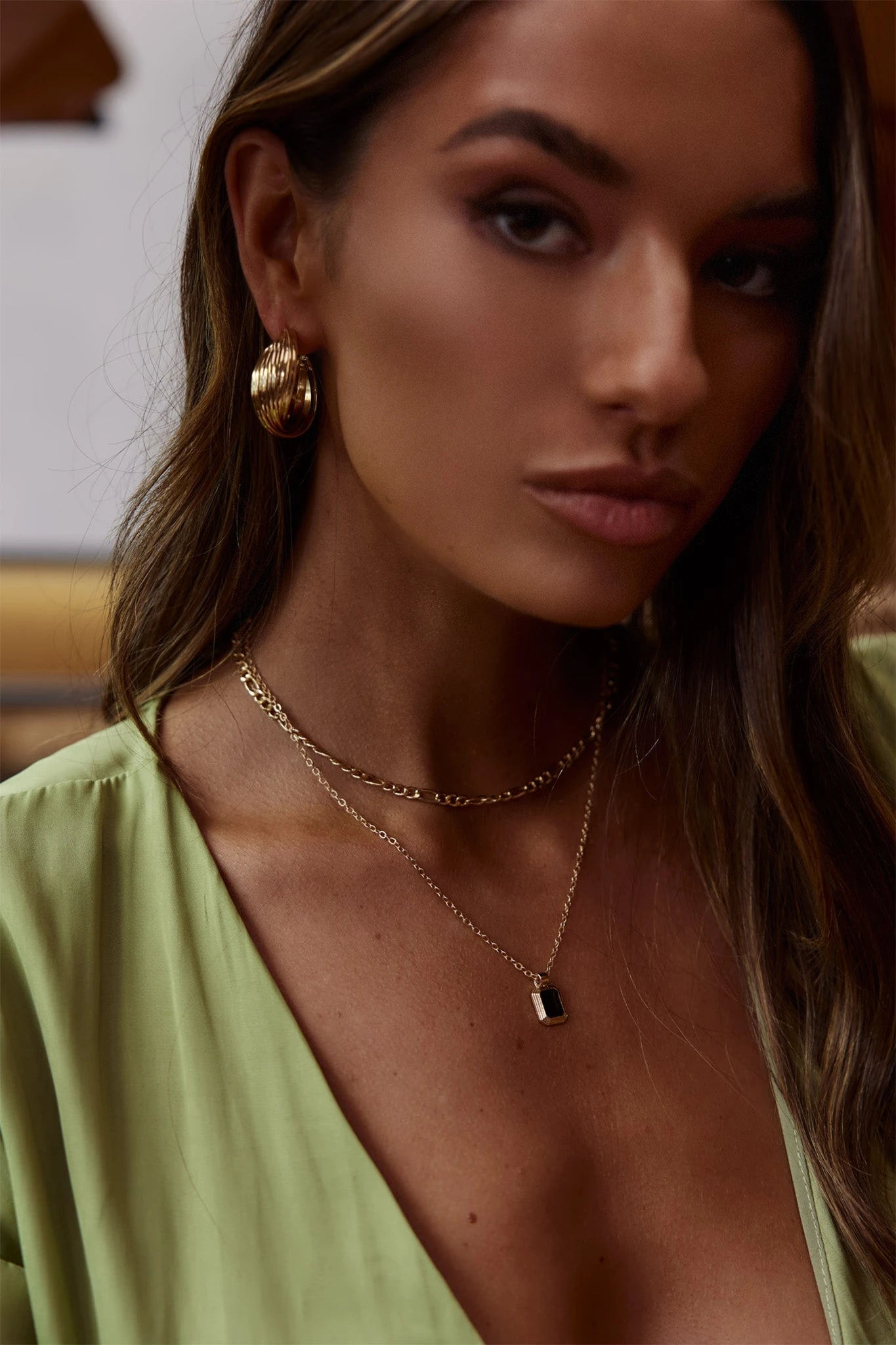 Celia Twist Hoop Earrings Gold 4 Celia Twist Hoop Earrings Gold - Image 2