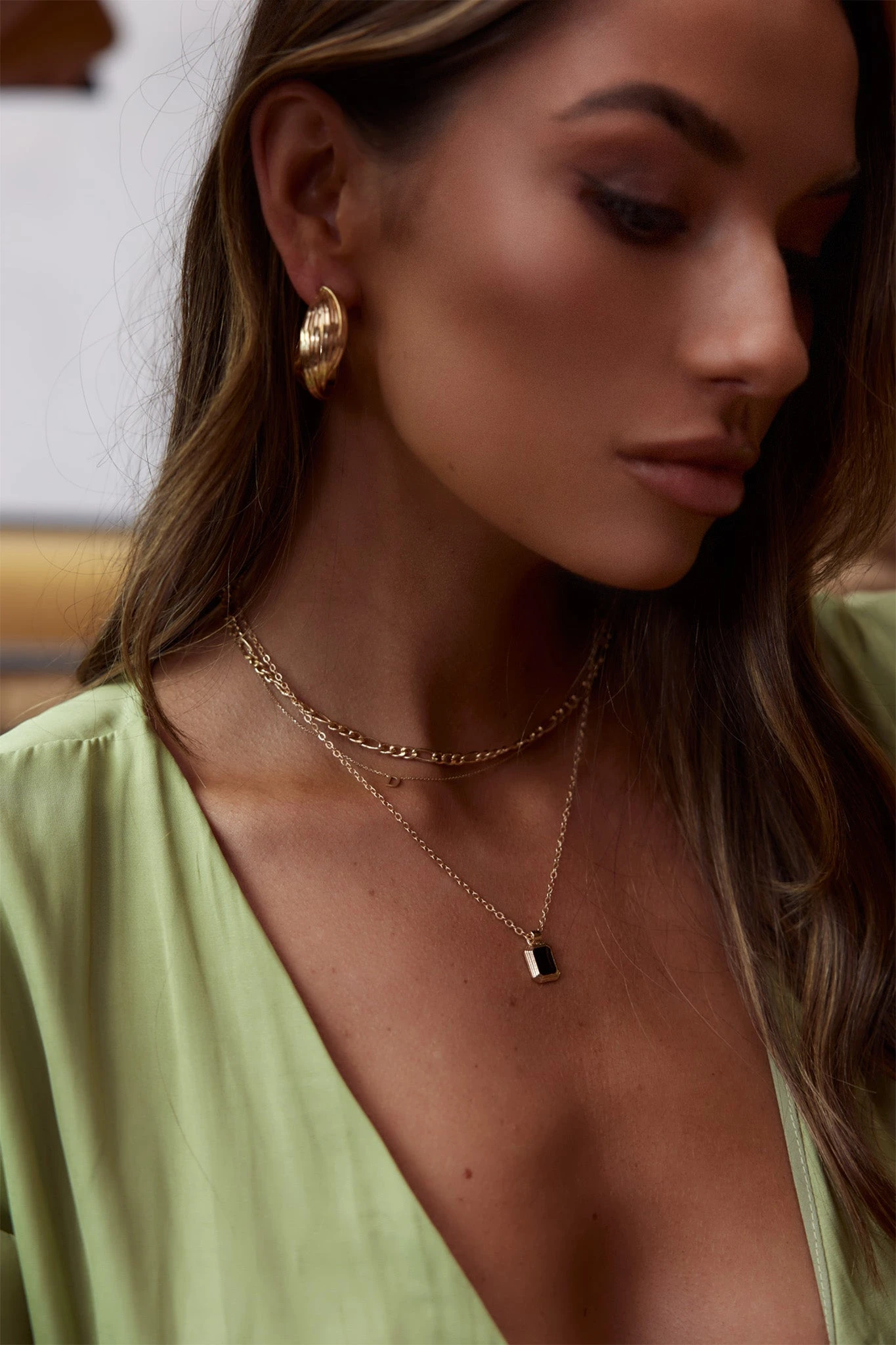 Celia Twist Hoop Earrings Gold 9 Celia Twist Hoop Earrings Gold - Image 7